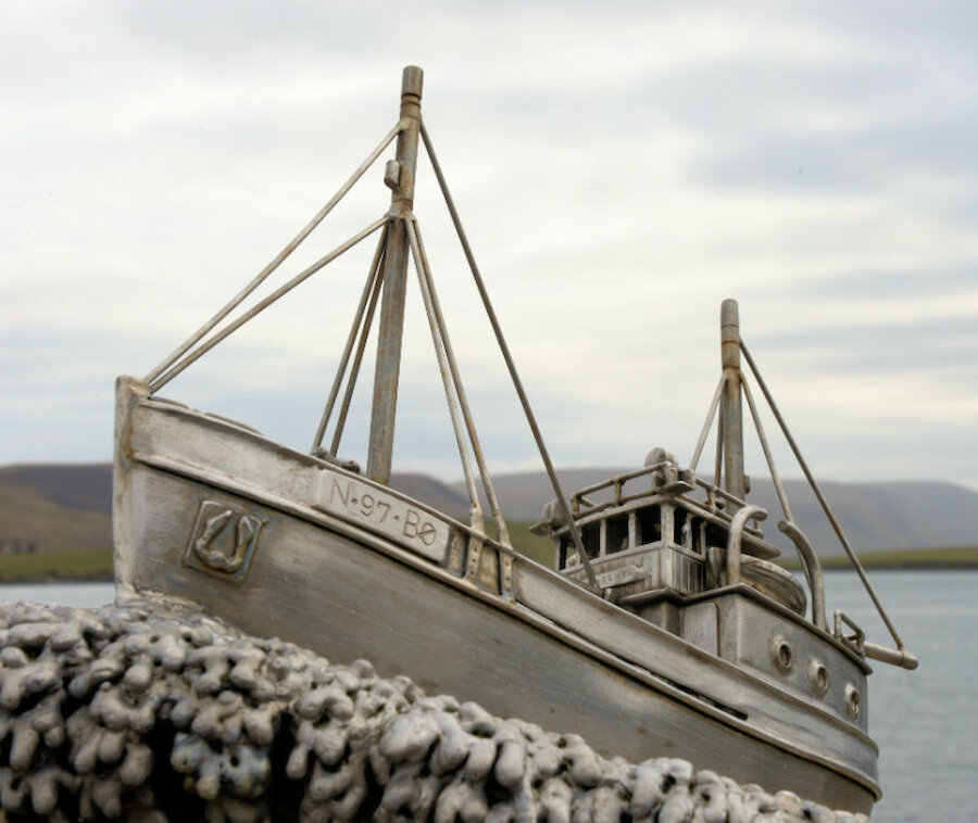 The memorial incorporates a model of one of the original fishing boats used by the Shetland Bus (Courtesy Alastair Hamilton)