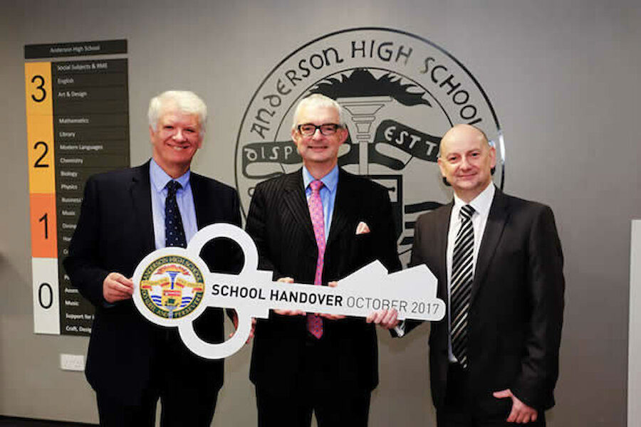 Mark Clarke (left) Project Director, Morrison Construction; Mark Boden (centre) Chief Executive, Shetland Islands Council; and Phil McVey (right), Director, Hub North Scotland, at the handover (Courtesy Shetland Islands Council))