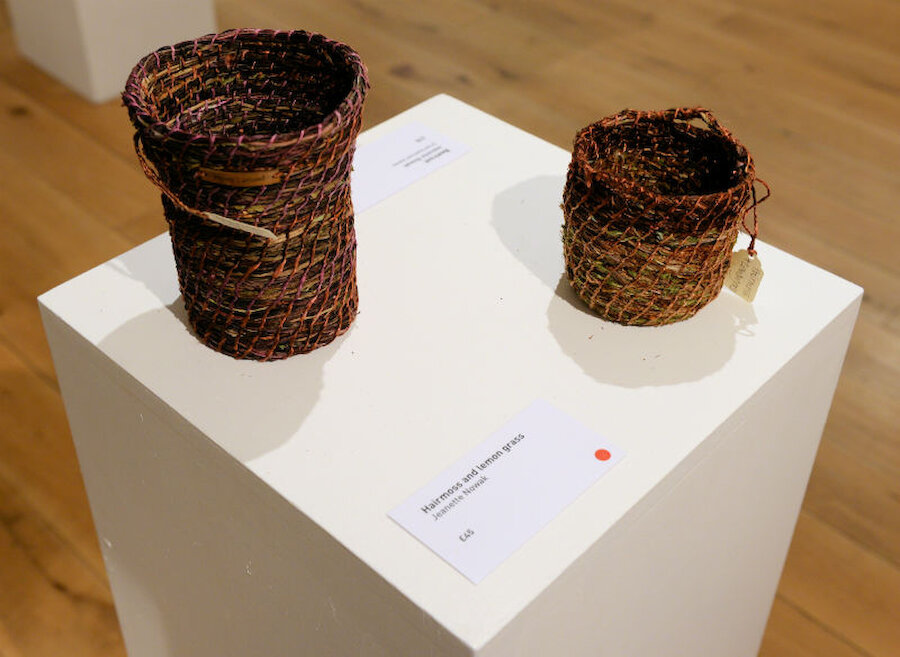 Two of Jeanette Nowak's beautifully-worked small baskets.