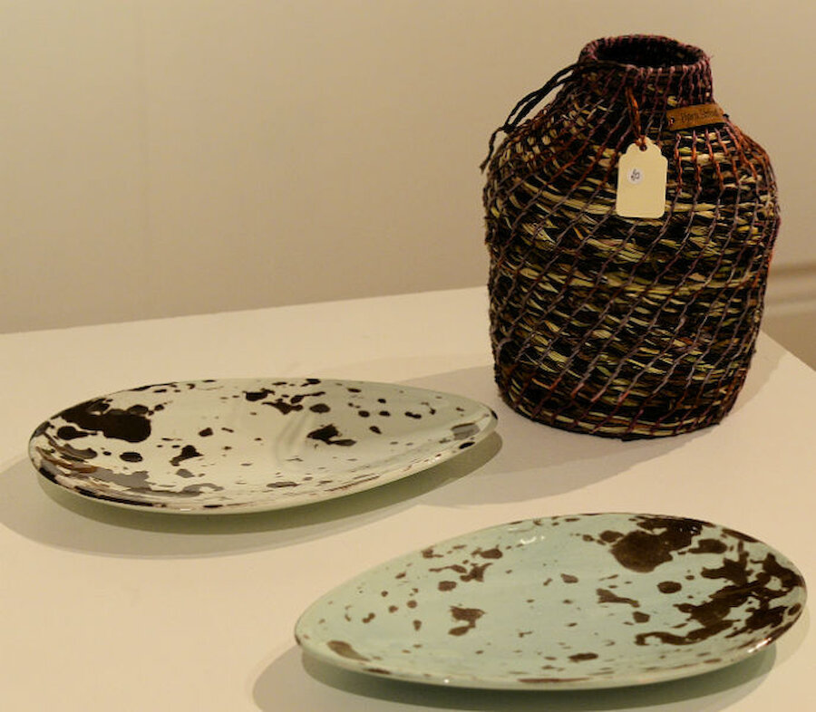 Two of Bill Brown's ceramic pieces, with another of Jeanette Nowak's pieces.