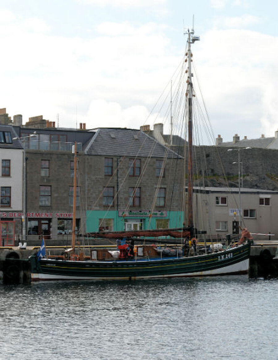 'Swan', Shetland's restored sail-fishing vessel, dates from 1900. Here, she's seen at Albert Wharf in Lerwick after returning from a Boat Week cruise (Courtesy Alastair Hamilton)