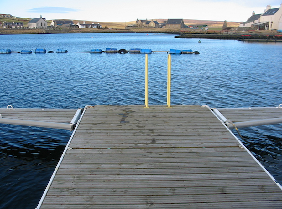 Walls, set around a sheltered bay, is seen here from its marina (Courtesy Promote Shetland)