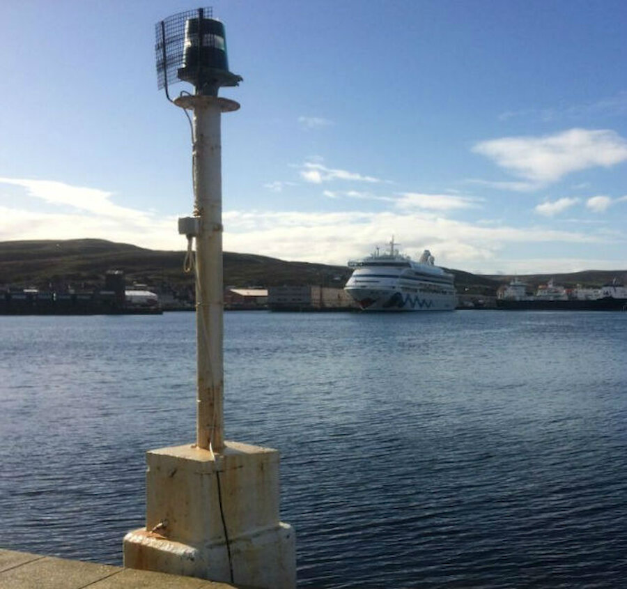 The first liner of 2107, AIDAVita, lies at Lerwick on a glorious April afternoon (Courtesy Alastair Hamilton)