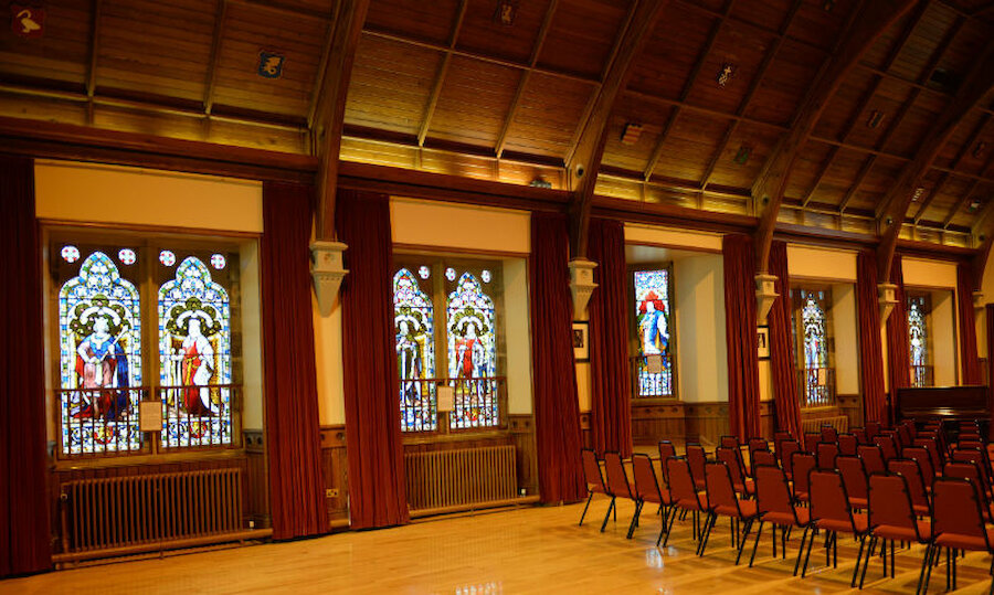 Windows in the west wall of the main hall, part of the narrative sequence of stained glass (Courtesy Alastair Hamilton)