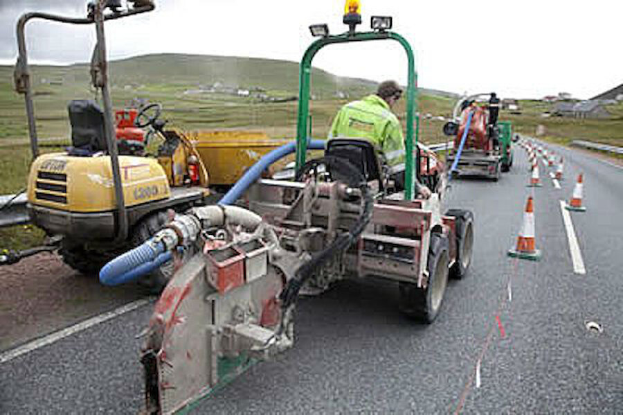 Local contractors, Tulloch Developments, invested in a special micro-trenching machine which buries fibre-optic cables in a narrow, 100mm deep slot in main roads.